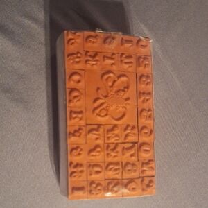 Orange Rubber Stamp with Numbers and Bee Design